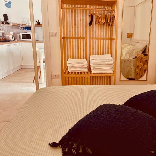 camera-da-letto-casa-lu-mare
